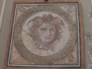 Tile mosaic of Medusa's head. Impressive tones comprised of bits of tile made ~2000 years ago...