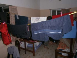 Our twin room at the ashram. Very small and basic plus it doubles as a laundry