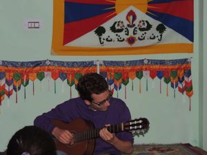 One of the French volunteers providing a French twist to the cultural show.